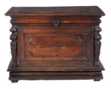 A French oak chest, probably Normandy, late 17th century and later, with flanking baluter pilasters