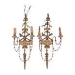 A pair of Italian carved wood and gilt composition twin light wall appliques, early 20th century,