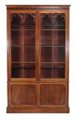 A mahogany Gothic revival library bookcase , 19th century and later, 254cm high, 149cm wide, 36cm