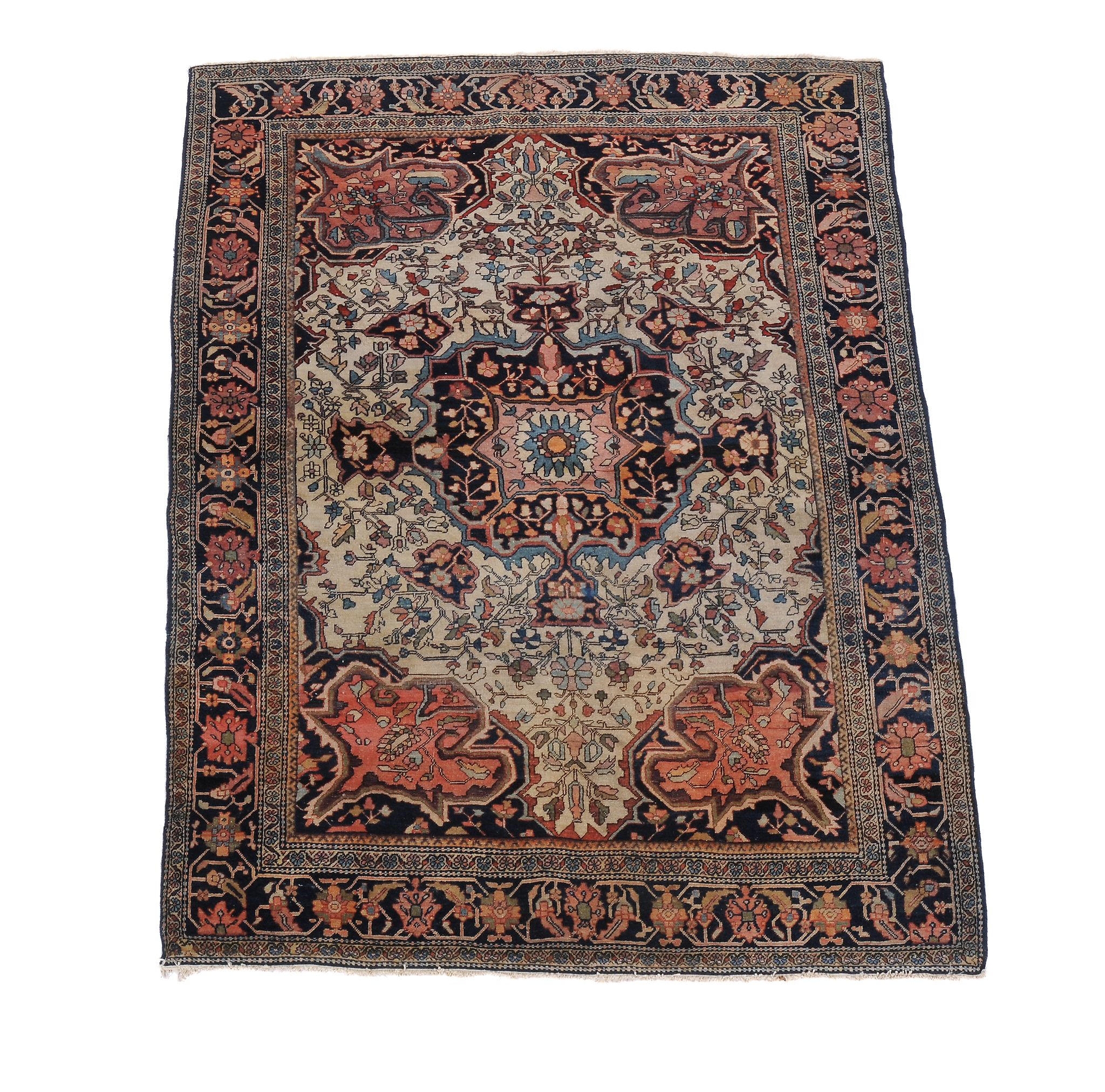A Sarouk Feraghan rug, the cream field profusely decorated with flowerheads and foliage in