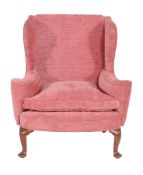 A wing armchair in George II style , late 19th century, 107cm high, 96cm wide, 70cm deep