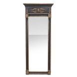 A continental ebonised and parcel gilt wall mirror , 20th century, in Egyptian revival taste,