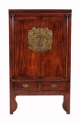 A Chinese hardwood and metal mounted 'Marriage' cabinet, late 19th/ early 20th century, the pair of