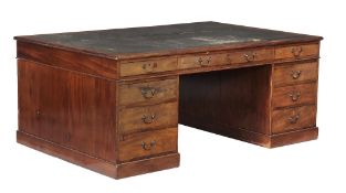 A partner s mahogany desk in George III style , 20th century, the inset top above an arrangement of