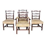 A set of four George III mahogany ladder back dining chairs , late 18th century, after a design by