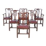 A set of six George III carved mahogany dining chairs , circa 1810, after the manner of Thomas