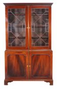 A mahogany and glazed cabinet bookcase in George III style , 20th century, 209cm high, 122cm wide,