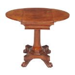 A George IV kingwood games table , circa 1825, the oval top with sliding section revealing a tooled