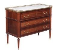 A French Directoire walnut commode , circa 1830, the marble top with brass gallery, above three