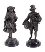 A pair of Continental patinated bronze models of itinerant musicians, late 19th century, a young