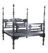 An Anglo-Indian ebonised hardwood double bed , 20th century, 221cm high, 220cm high, 188cm wide