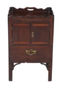 A George III mahogany commode , circa 1780, the tray top with pierced handles, 76cm high, 48cm