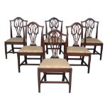 A set of six George III mahogany dining chairs , circa 1780, each with vertical flat splat with