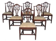 A set of six George III mahogany dining chairs , circa 1780, each with vertical flat splat with
