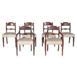 A harlequin set of mahogany dining chairs , circa 1820, to include two armchairs, together with a