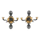 A pair of fine Empire gilt and patinated bronze three light wall appliques, early 19th century, the