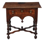 A William and Mary oak side table , circa 1690, with singe frieze drawer and X-shaped stretcher,