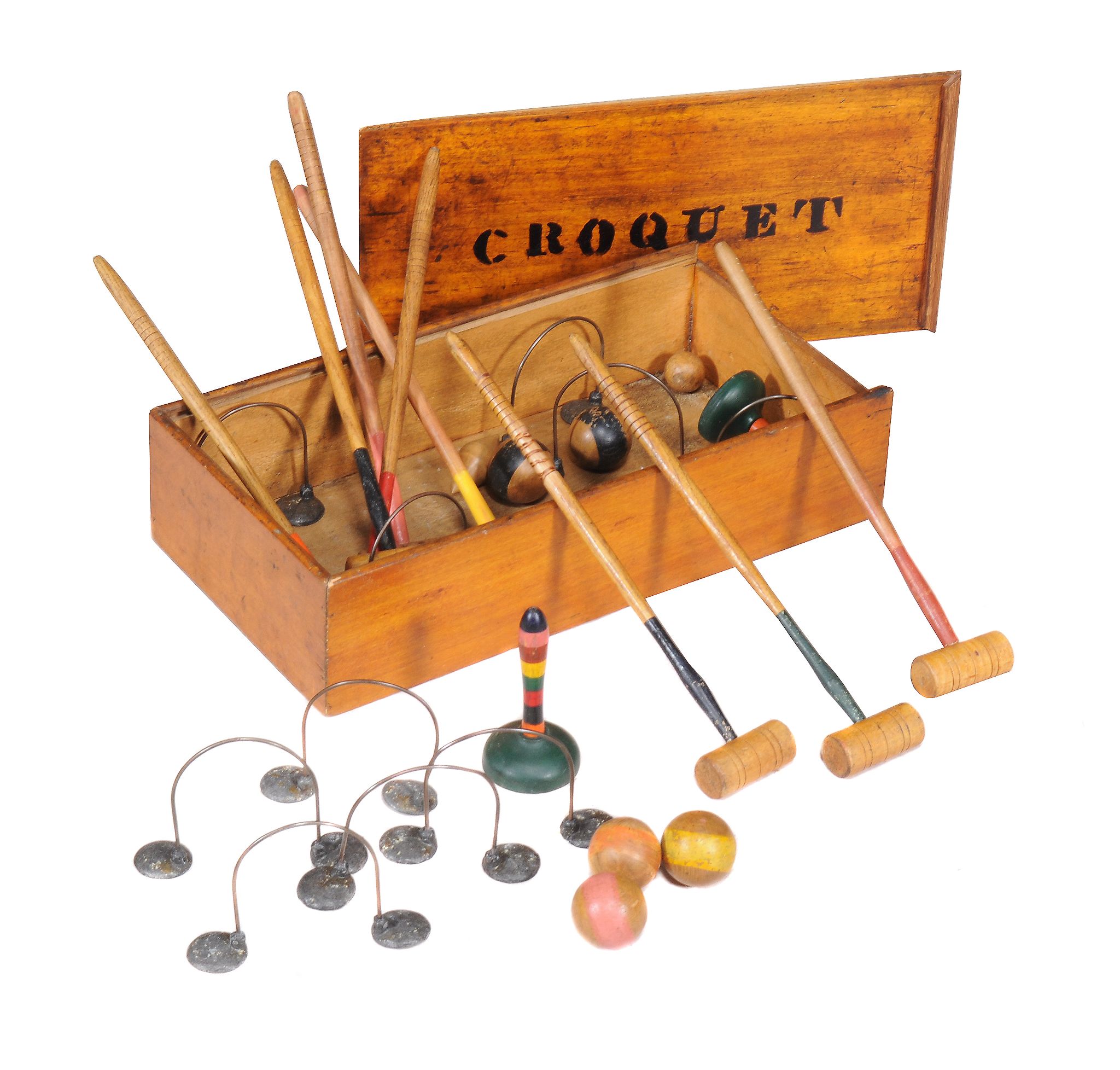 A table top croquet set in late Victorian style , comprising eight malletts, eight corresponding
