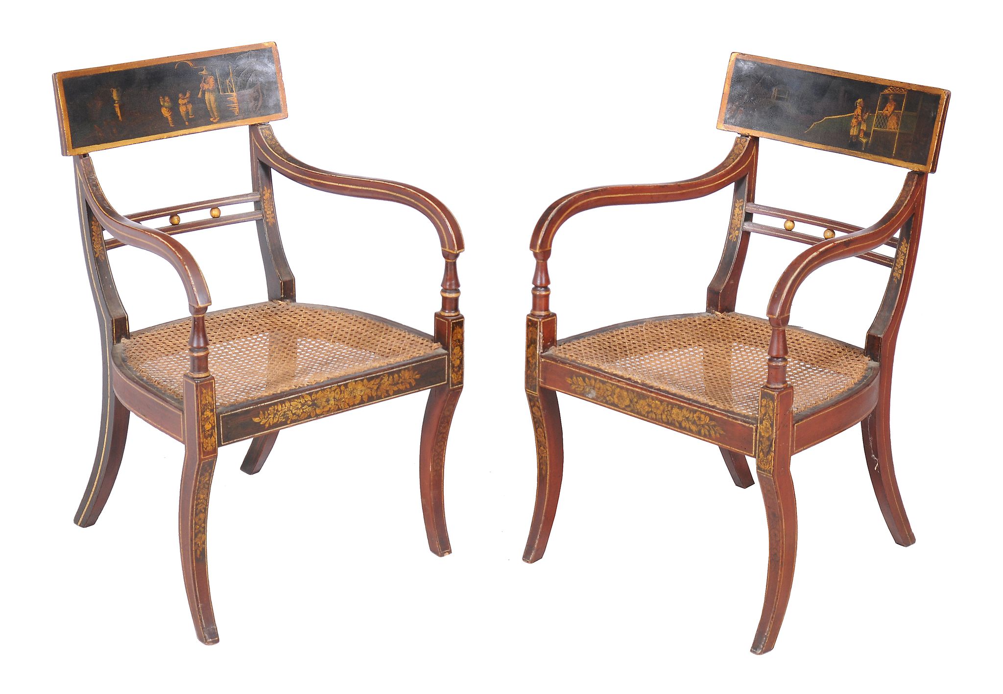 A pair of Regency japanned, red lacquered and gilt decorated armchairs , circa 1815, the bar backs