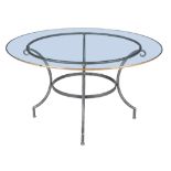 An iron and glass mounted circular dining table , of recent manufacture, 71cm high, 132cm diameter,