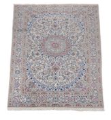 A Nain carpet, approximately 299 x 195cm