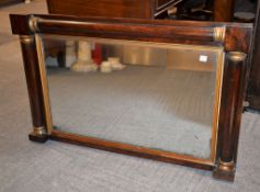 Ω A William IV rosewood and parcel gilt overmantel mirror, 60cm high, 95cm wide