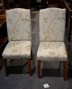 A set of four upholstered dining chairs, modern, each 105cm high