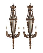 A pair of Italian carved and gilt wood twin light girandoles, early 20th century, the electrical