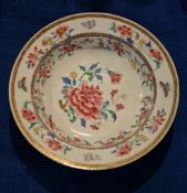 An 18th century Chinese famille rose plate, 24cm diameter