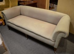 A late-Victorian upholstered sofa, in the manner of Howard and Sons, 69cm high, 125cm wide, 90cm