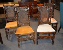 A set of four walnut side chairs in the 17th century style, with caned backs and seats on bobbin