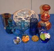 An assortment of mostly coloured glass to include a pale ruby flashed night carafe and goblet,