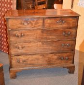 A George III mahogany chest of two short and three long drawers, 106cm high, 110cm wide, 52cm deep