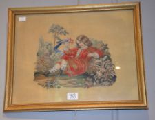 A Victorian needlework panel of a young boy with a bird