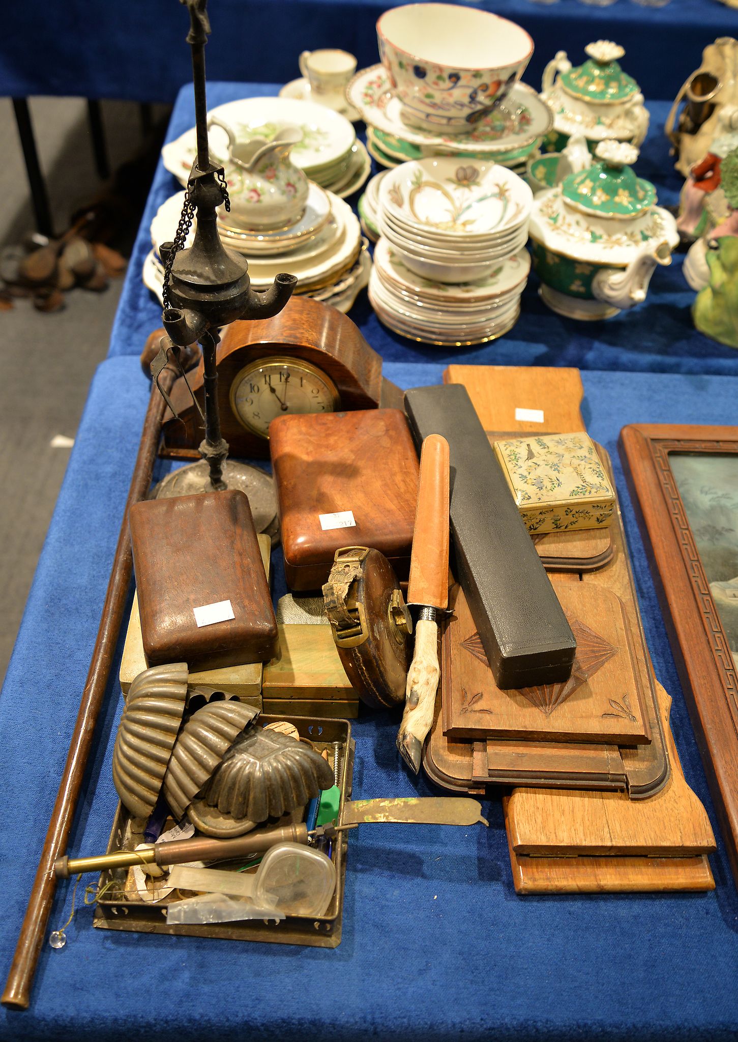 A mantel clock, two expanding book racks, etc.