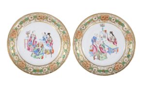 A pair of Chinese Cantonese enamelled porcelain plates, 19th century, painted with oriental
