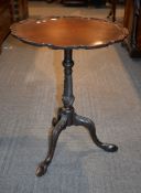 A mahogany tripod table in George III Irish style, early 20th century, 70cm high, the top 53.5cm