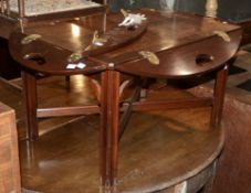 A reproduction mahogany butler's tray coffee table in George III style, 20th century, 47cm high, and