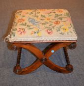 Ω A Regency rosewood X-frame foot stool with later upholstered seat, 35cm high, the seat 42cm x 40cm