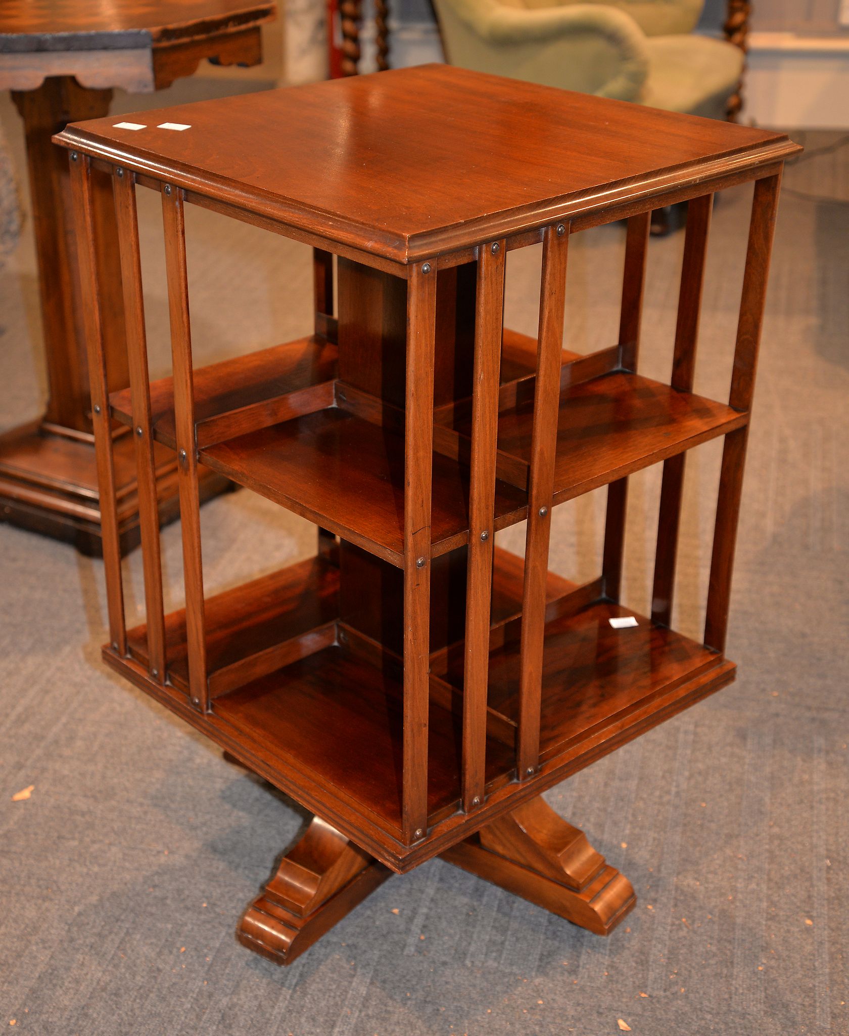 A mahogany revolving bookcase, 20th century, 81cm high, 47cm square