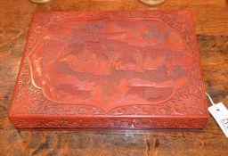 A Chinese cinnabar lacquer box and cover, late 19th or 20th century, the cover carved with figures