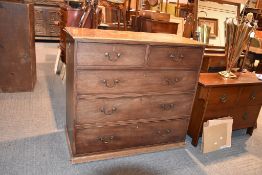 A 19th century mahogany chest of two short and three long drawers, feet lacking, 99cm high, 106cm