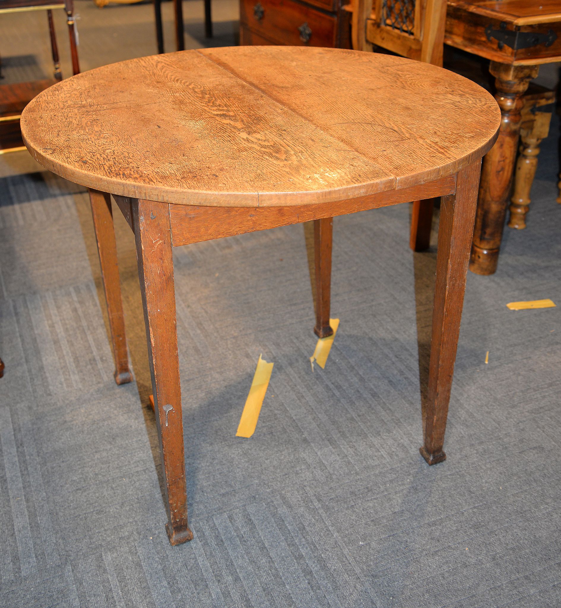 An oak occasional table, with circular top, 86cm diameter