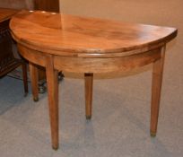 A 19th century mahogany demi lune tea table, 75cm high, 115cm wide, 56cm deep