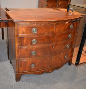 A George III bowfront chest of drawers, with four long graduated drawers, 85cm high, 103cm wide