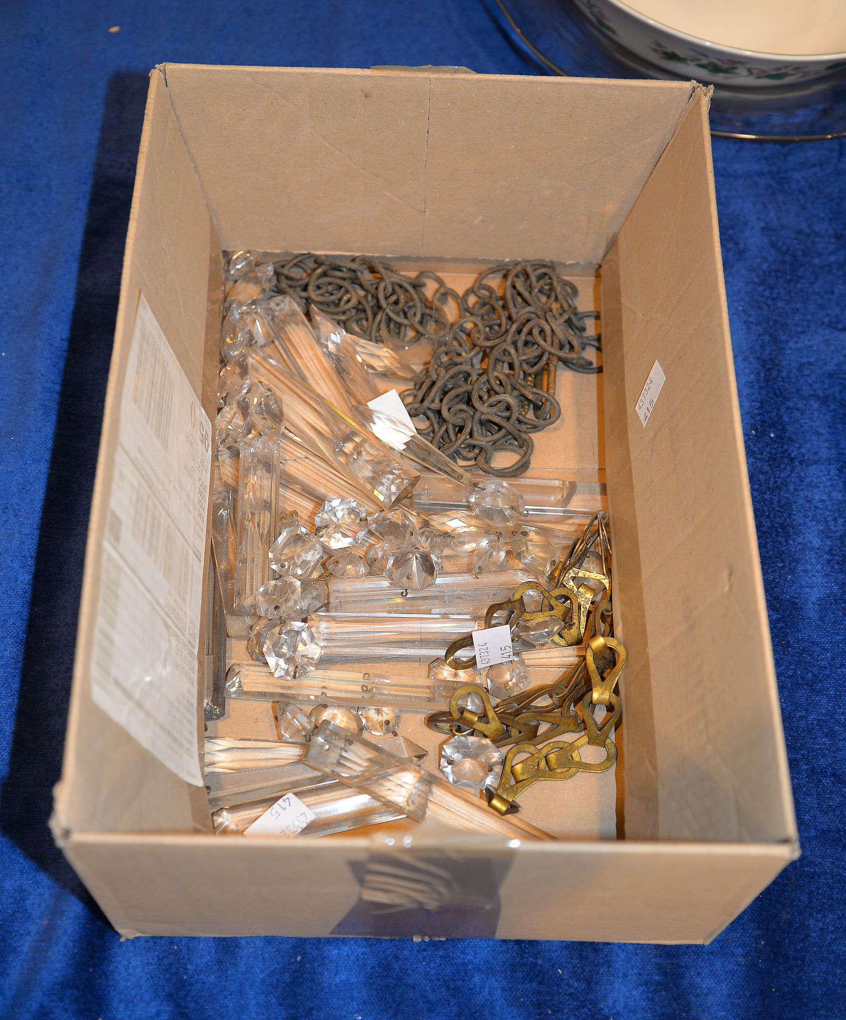 A box containing a small quantity of 19th century cut glass lustres