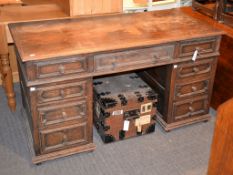 A Victorian oak twin pedestal desk, late 19th century, 77cm high, 137cm wide, 69cm deep