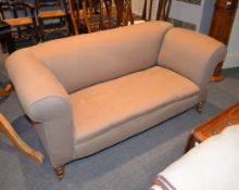 A Victorian turned beech and upholstered 'drop-end' sofa, one arm hinged to form a daybed, 175cm