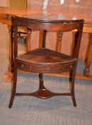 A Geo III mahogany corner washstand, with apertures for bowl and single drawer to central tier, 84cm