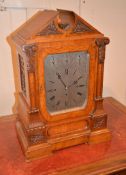 A late Victorian oak cased bracket clock, with eight-day three-train movement, the 7 1/2 inch